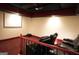 View of the plush tiered seating in the home movie theatre at 1010 Forest Overlook Sw Dr, Atlanta, GA 30331