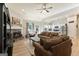 Bright living room with fireplace open to kitchen, ideal for entertaining at 344 Dylan Way, Mcdonough, GA 30252