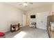 Bright playroom with a range of play options and ample closet space at 344 Dylan Way, Mcdonough, GA 30252