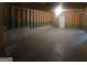 Unfinished basement featuring exposed beams and foundation, offering potential for customization at 7253 Lacey Dr, Douglasville, GA 30134