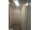 Walk-in closet features a single wire shelf and space for organizing personal belongings at 7253 Lacey Dr, Douglasville, GA 30134