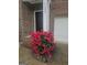 Charming front of home featuring beautiful flowering bushes at 7253 Lacey Dr, Douglasville, GA 30134