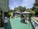View of the deck featuring a built in grill and additional seating at 520 Mcdonough Rd, Hampton, GA 30228