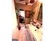 A quaint bathroom with toilet, white vanity, framed art, and ornate mirror at 520 Mcdonough Rd, Hampton, GA 30228