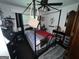 Intimate bedroom with a four poster bed, ceiling fan, and dresser at 520 Mcdonough Rd, Hampton, GA 30228