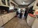 Bright kitchen with white cabinets, tile floors, and modern appliances at 520 Mcdonough Rd, Hampton, GA 30228