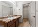 Bathroom vanity with laminate countertops, mirror, and enclosed storage at 2714 Haynescrest Dr, Grayson, GA 30017