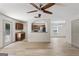 Open living space showcases hardwood floors and seamless flow to the kitchen at 2714 Haynescrest Dr, Grayson, GA 30017
