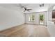 Spacious living room featuring wood floors and a bright view of the backyard at 2714 Haynescrest Dr, Grayson, GA 30017