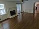 Spacious living room with hardwood floors, fireplace, and natural light at 7640 Ryefield Dr, Sandy Springs, GA 30350