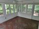 Bright sunroom with tiled floors and multiple windows at 7640 Ryefield Dr, Sandy Springs, GA 30350