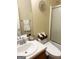 Full bathroom with sink, toilet, towels and shower at 2517 Walter Way, Stockbridge, GA 30281