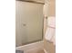 Bathroom shower with glass doors and towel at 2517 Walter Way, Stockbridge, GA 30281
