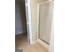 En-suite bathroom features tile floor, a framed shower, and a closet at 2517 Walter Way, Stockbridge, GA 30281
