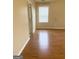 This bedroom features wood flooring and a window at 2517 Walter Way, Stockbridge, GA 30281