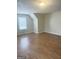 Spacious bedroom features wood flooring and window at 2517 Walter Way, Stockbridge, GA 30281