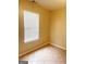 Neutral bedroom with window at 2517 Walter Way, Stockbridge, GA 30281