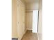 View of the closet and doors on neutral tile floor at 2517 Walter Way, Stockbridge, GA 30281