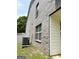 Exterior corner featuring brick and vinyl siding, along with a modern air conditioning unit at 2517 Walter Way, Stockbridge, GA 30281