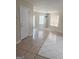 Bright living area showcasing tile floors, natural light, and seamless flow at 2517 Walter Way, Stockbridge, GA 30281
