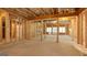 Unfinished basement framed for future living space with door and window openings at 10765 Shallowford Rd, Roswell, GA 30075