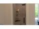 Bathroom featuring glass enclosed shower with rainfall shower head at 10765 Shallowford Rd, Roswell, GA 30075