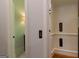 Interior elevator with call buttons on two floors at 10765 Shallowford Rd, Roswell, GA 30075
