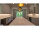 Spacious kitchen features a large island and stainless steel appliances at 10765 Shallowford Rd, Roswell, GA 30075