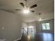 Spacious living room with hardwood floors, vaulted ceilings, and ample natural light at 54 Crestwood Dr, Dallas, GA 30157