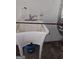 Utility sink with faucet, underneath is a storage space at 54 Crestwood Dr, Dallas, GA 30157