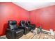 Basement featuring three black leather recliners on a plywood platform at 145 Windward Hls, Mcdonough, GA 30253