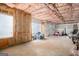 Unfinished basement with exposed insulation and windows, providing ample storage at 145 Windward Hls, Mcdonough, GA 30253