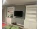 Finished basement with carpet, built-in shelving, and recessed lighting, perfect for entertaining at 2667 Hampton Park Dr, Marietta, GA 30062