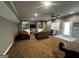 A spacious finished basement featuring recessed lighting, carpet, a ceiling fan, and patio door at 2667 Hampton Park Dr, Marietta, GA 30062