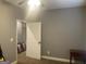 Neutral bedroom with carpet, ceiling fan, and a doorway leading to another room at 2667 Hampton Park Dr, Marietta, GA 30062