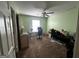 Comfortable bedroom with ample space for a desk and storage, featuring natural light at 2667 Hampton Park Dr, Marietta, GA 30062