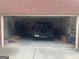 Well-organized two-car garage with ample storage, ladder, and a vehicle inside at 2667 Hampton Park Dr, Marietta, GA 30062