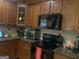 Well-equipped kitchen with granite countertops, modern appliances, and ample cabinet space at 2667 Hampton Park Dr, Marietta, GA 30062
