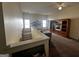 Open living room with neutral tones, a ceiling fan, and built in entertainment center at 2667 Hampton Park Dr, Marietta, GA 30062