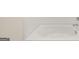 Clean bathtub with white subway tile at 325 Silver Moon Dr, Loganville, GA 30052