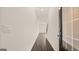 Inviting entryway with wood flooring, neutral walls, and a decorative front door at 325 Silver Moon Dr, Loganville, GA 30052