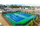 Aerial view of the community tennis courts, showcasing a recreational amenity for residents at 325 Silver Moon Dr, Loganville, GA 30052