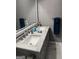 Modern bathroom featuring double sinks with granite countertops at 785 Ne South Pine St, Conyers, GA 30012