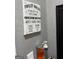 Bathroom with modern accessories and funny wall art at 785 Ne South Pine St, Conyers, GA 30012