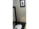 Bathroom featuring black granite countertop, white vessel sink and framed mirror at 785 Ne South Pine St, Conyers, GA 30012