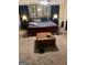 Comfortable primary bedroom featuring a king bed, plush carpeting, and elegant decor at 785 Ne South Pine St, Conyers, GA 30012