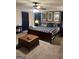 Comfortable primary bedroom featuring a king bed, plush carpeting, and elegant decor at 785 Ne South Pine St, Conyers, GA 30012