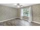 Bedroom features a large window that lets in plenty of natural light at 19 Indian Bluff Dr, Sharpsburg, GA 30277