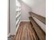 Closet boasts white shelving and wood shelving to enhance storage and organization in the home at 19 Indian Bluff Dr, Sharpsburg, GA 30277