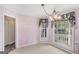 Eat-in kitchen with large windows providing natural light at 19 Indian Bluff Dr, Sharpsburg, GA 30277